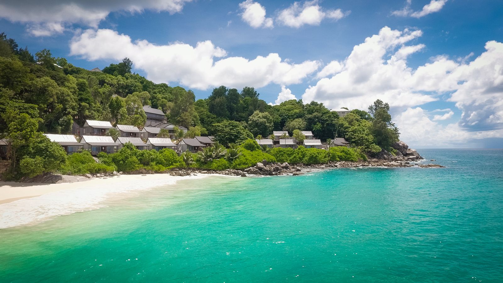 Seychellen Mahe Carana Beach Hotel chalets view from sea CTS.jpg - Jambo Safari Club